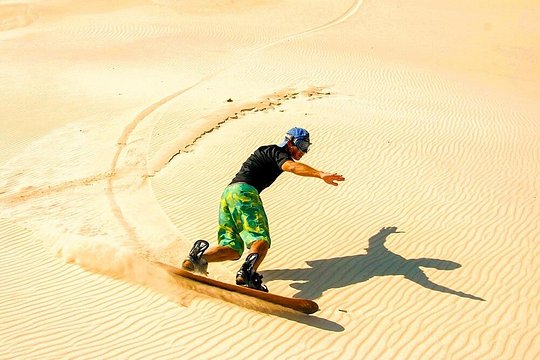 Dune Bashing, Sand Boarding & Camel Ride — photograph 4