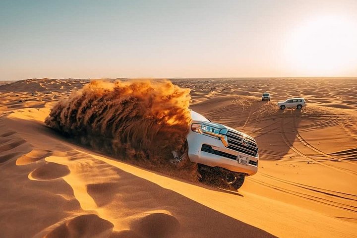 Red Dunes Safari, 4x4 Pickup/Drop,Camel Ride,Sand Board,BBQ&Shows