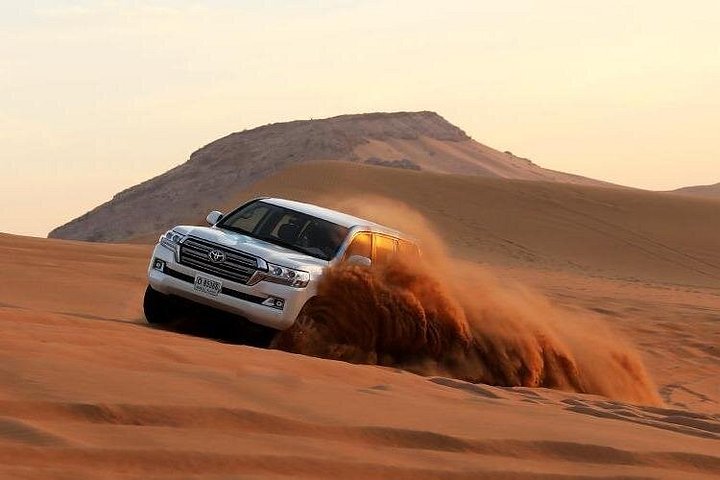 Morning Desert Safari in Dubai with Camel Ride and Sandboarding