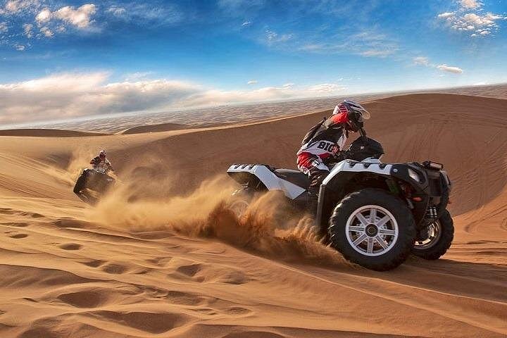 Morning Red Dunes by Quad Bike, Camel Ride and Sandboarding