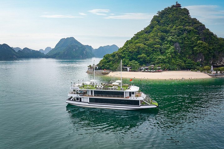 Luxury Halong Bay Day Cruise: Buffet, Kayak, Swim, Limousine Bus