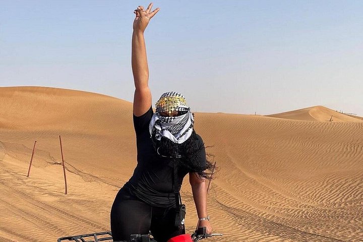 Morning Safari with Dune Bashing, Sand Boarding, Camel Ride