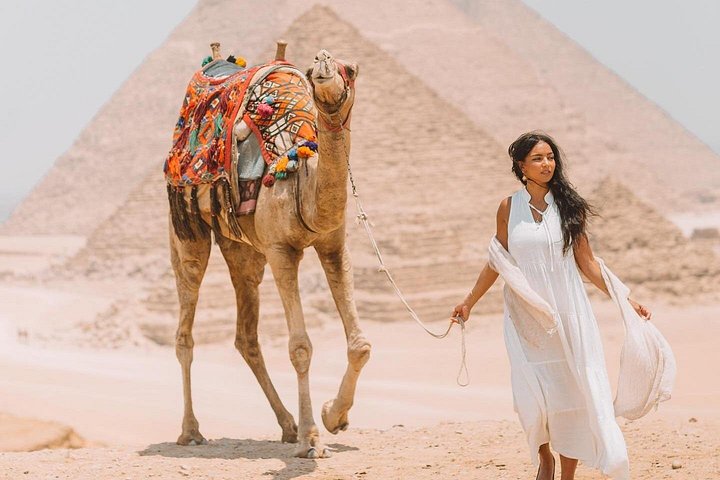 Half-Day tour Pyramids of Giza ,Sphinx ,Lunch & Camel Ride