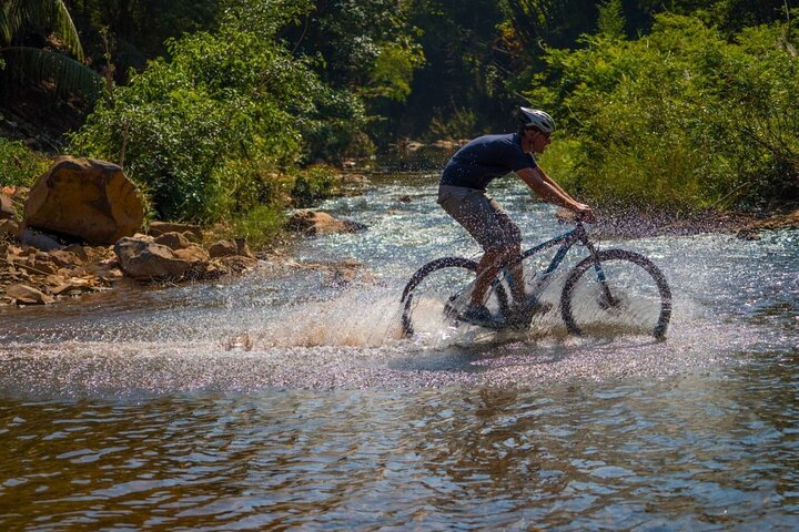 Luang Prabang Mountain Biking Trekking and Waterfall Private Tour