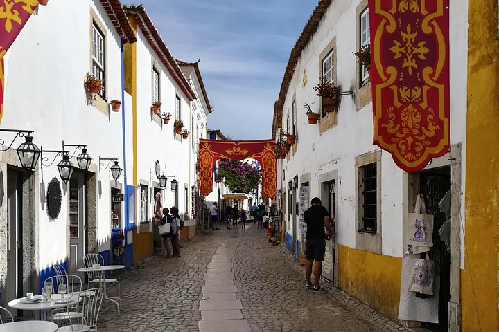 One Way Private Tour Lisbon to Coimbra via Obidos Nazare Fatima