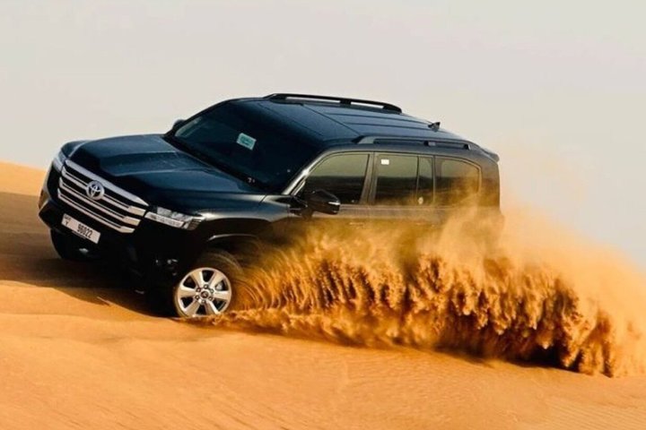 Abu Dhabi Desert Safari With Camel Riding BBQ and Live Shows